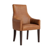 chaise de salle à manger avec accoudoirs en cuir cognac vue trois quarts